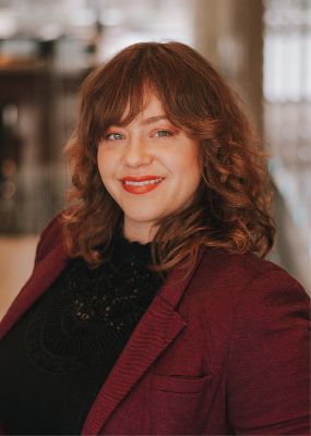 Portrait photo of Carly Grutel